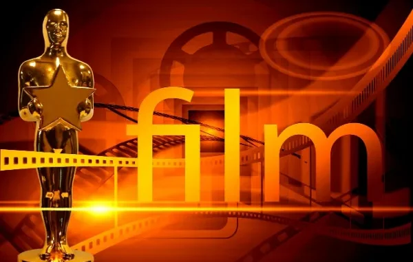 A golden statuette resembling an Oscar award, holding a large gold star, stands on the left. To the right, the word "film" is prominently displayed in a large, golden font, with glowing lines extending horizontally. The background is a gradient of warm orange and red, featuring faded silhouettes of film reels and film strips, suggesting a cinematic theme.
